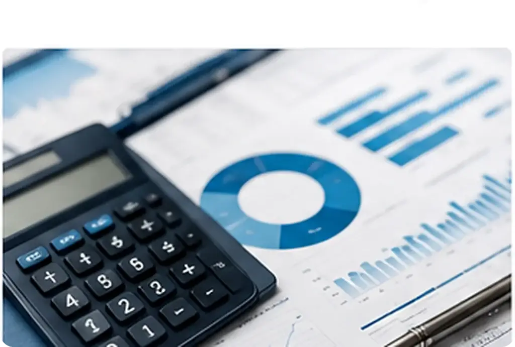 Calculator, financial charts and analytical documents arranged on a desk
